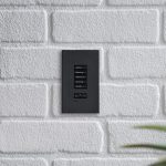 Automated lighting control keypad with backlit LED buttons and pewter faceplate
