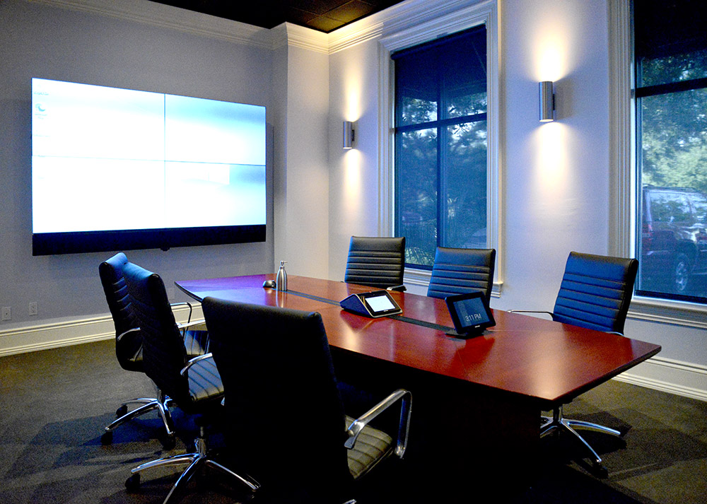 Custom designed conference room with video communication systems