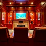 wood paneled home theater demo room at Custom Audio Video